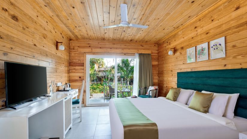Lawn-view room featuring a cozy bed and air conditioning at Aralea Beach Resort by Stone Wood, Morjim