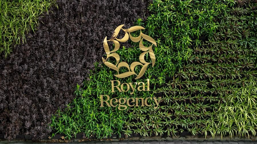 Exterior wall with Royal Regency logo and vertical garden at Hotel Royal Regency Chennai