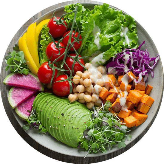 an bowl of assorted vegetables on a table