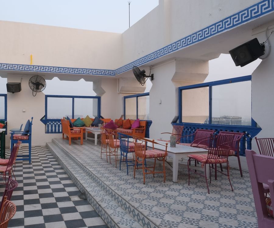 The seating area of ta BLU Rooftop Bar at Clarks Amer, Jaipur