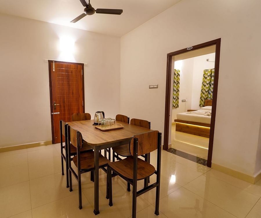 alt-text Le Poshe Luxury  Three Bedroom villa Dinning Area 1