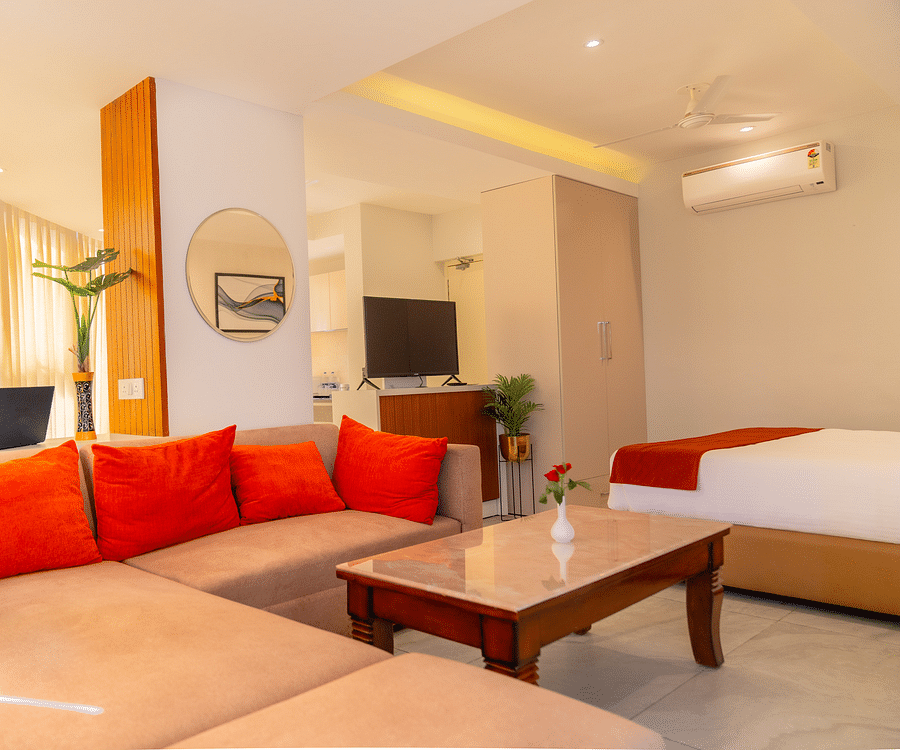 Living area with comfortable sofa of a Standard Room at Montclair Ananta, Elite.