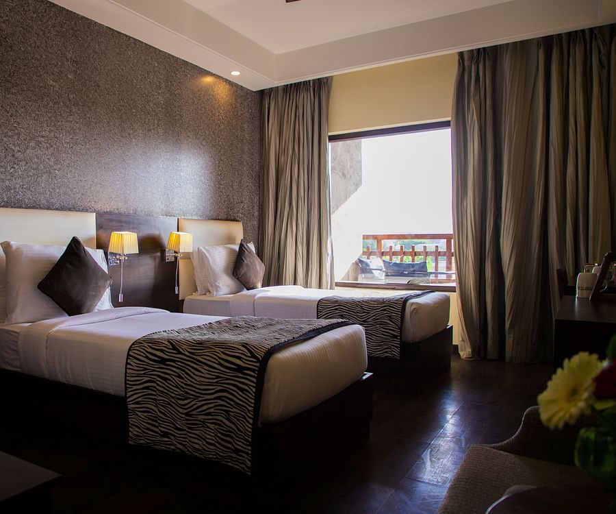 Twin room with plush beds