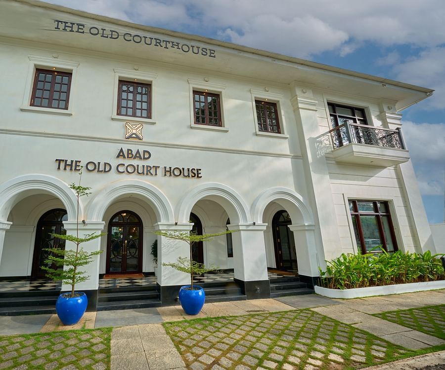facade image of the old court house by abad, fort kochi