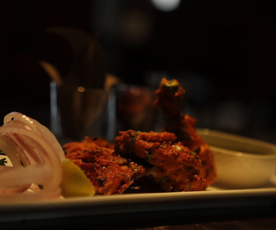 Udman By Ferns N Petals, Chattarpur - chicken dish on a table