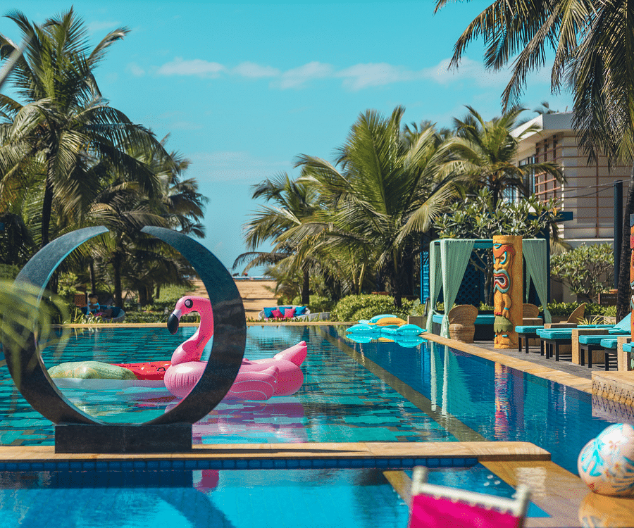 alt-text Swimming pool with floats for your destination wedding venue in goa