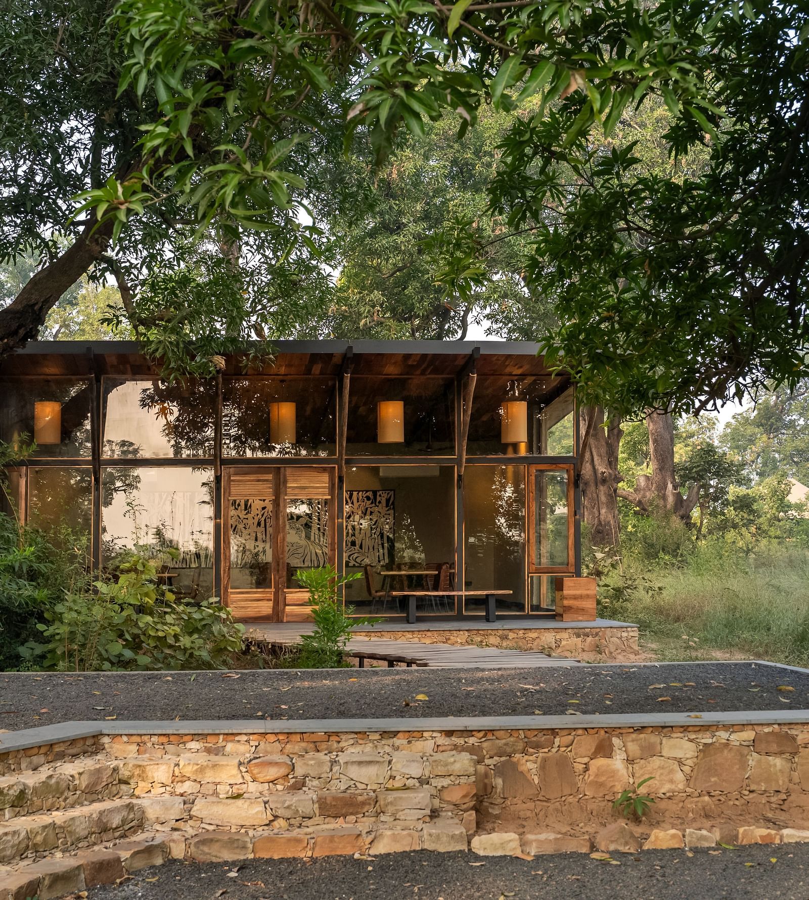 View of a hut amongst greenery at Trees N Tigers, Tadoba.