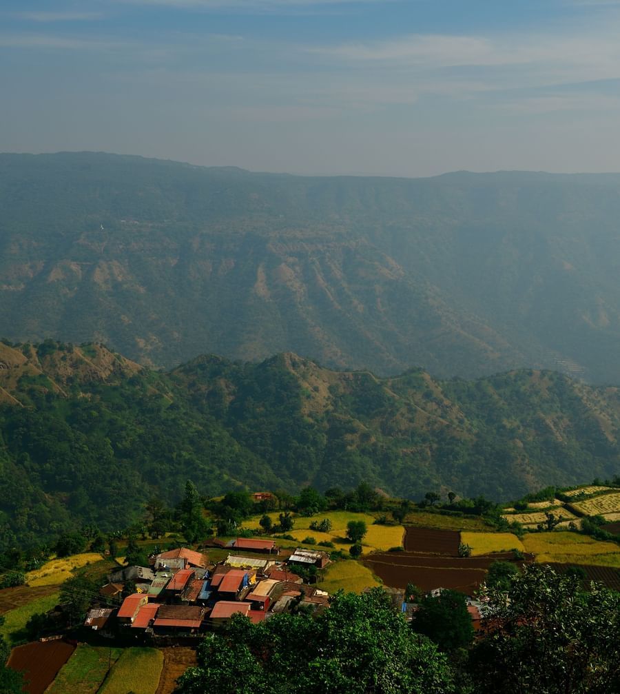 aerial view of a village on a hill in Mahabaleshwar