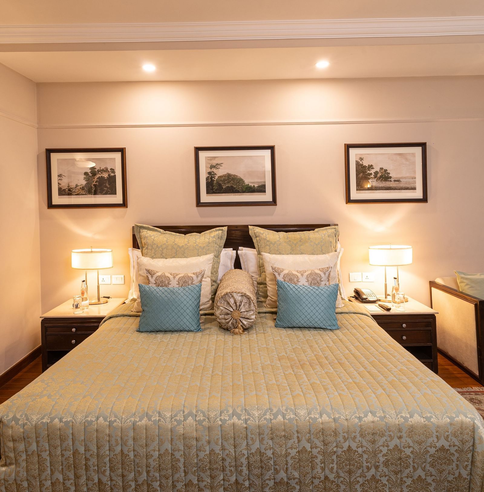 image of the boutique room featuring a king size bed with well kept pillows on it - The Claridges New Delhi