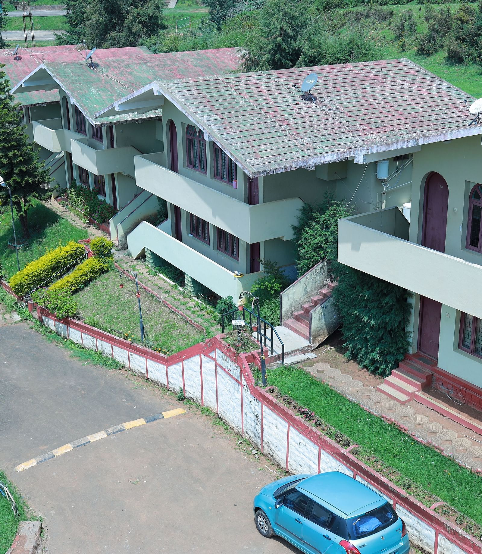 Facade image of Mango Hill Shola Ooty with greenery in the background | Mango Hill Shola, Ooty