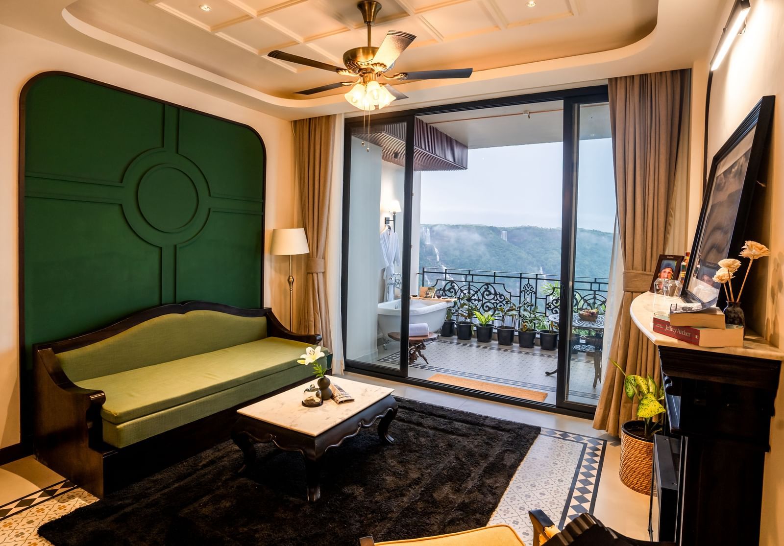Spacious seating area with wooden flooring at Polo Resort Cherrapunjee.