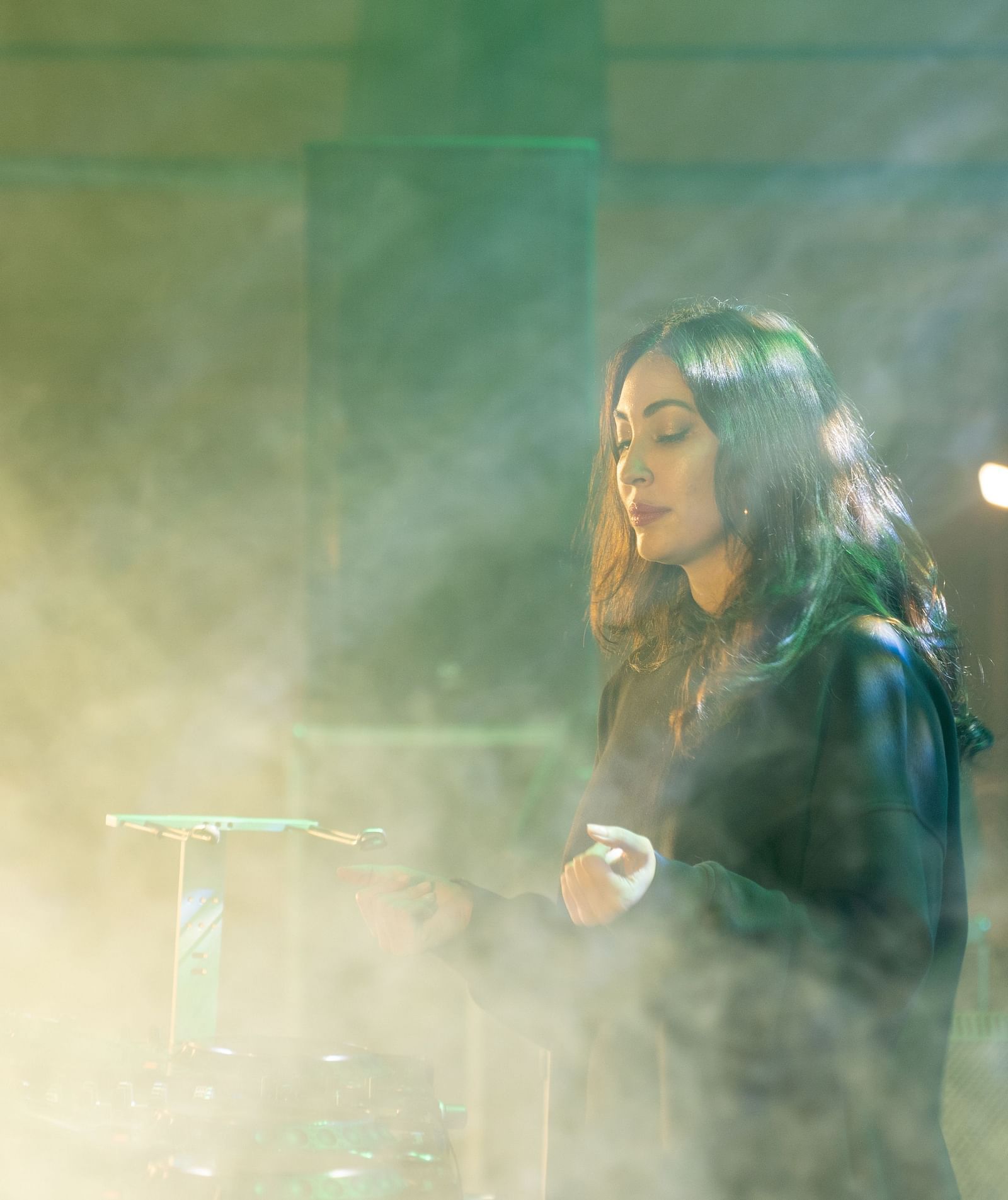 A singer singing at a concert at Nirvana Luxury Hotel, Ludhiana.