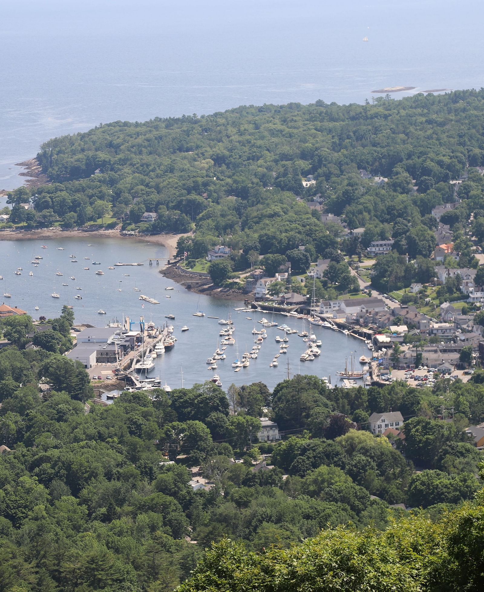 Aerial view of Camden Harbor and surrounding landscape near Hartstone Inn.