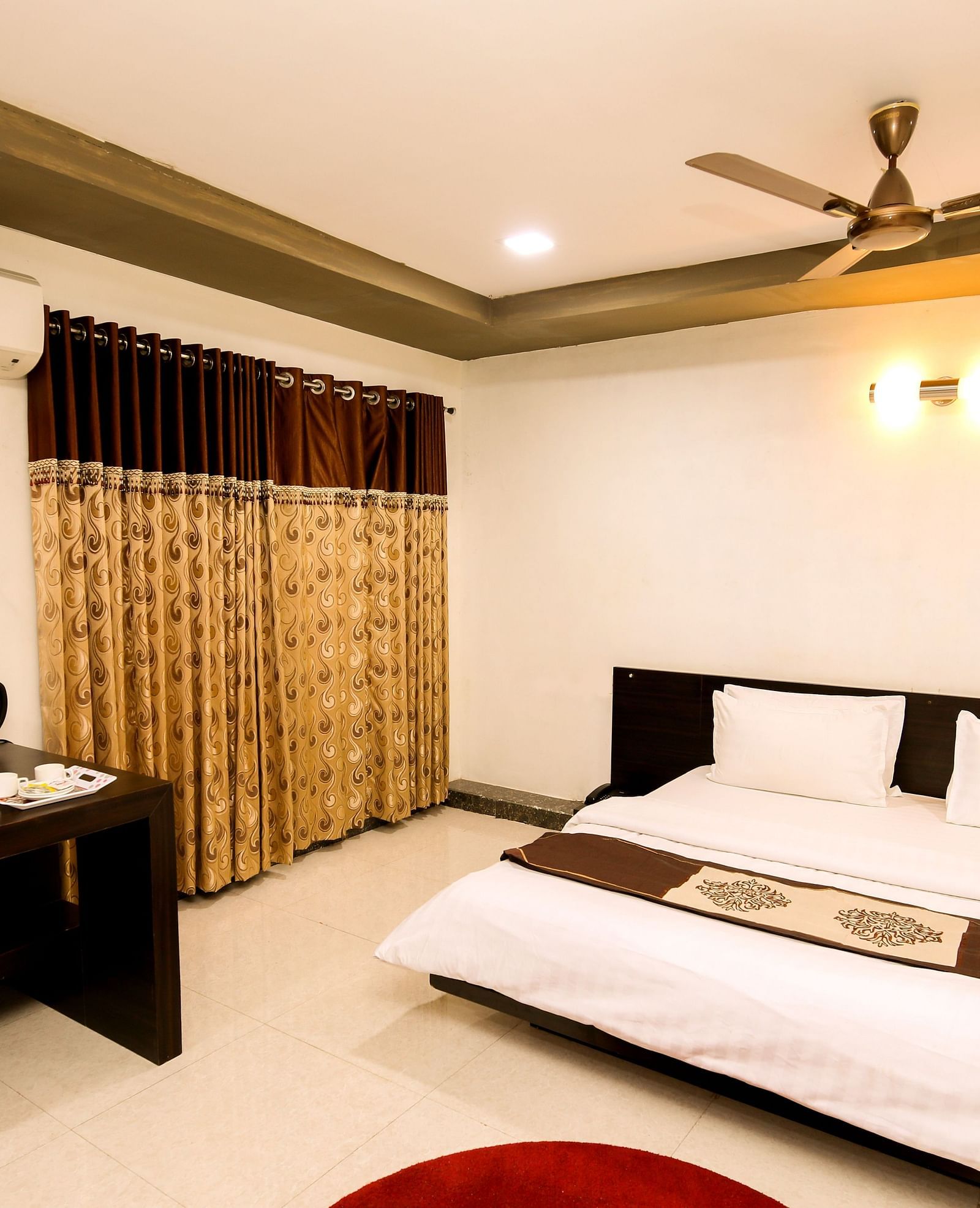 A room with with a double bed and work desk at Saavaj Resort