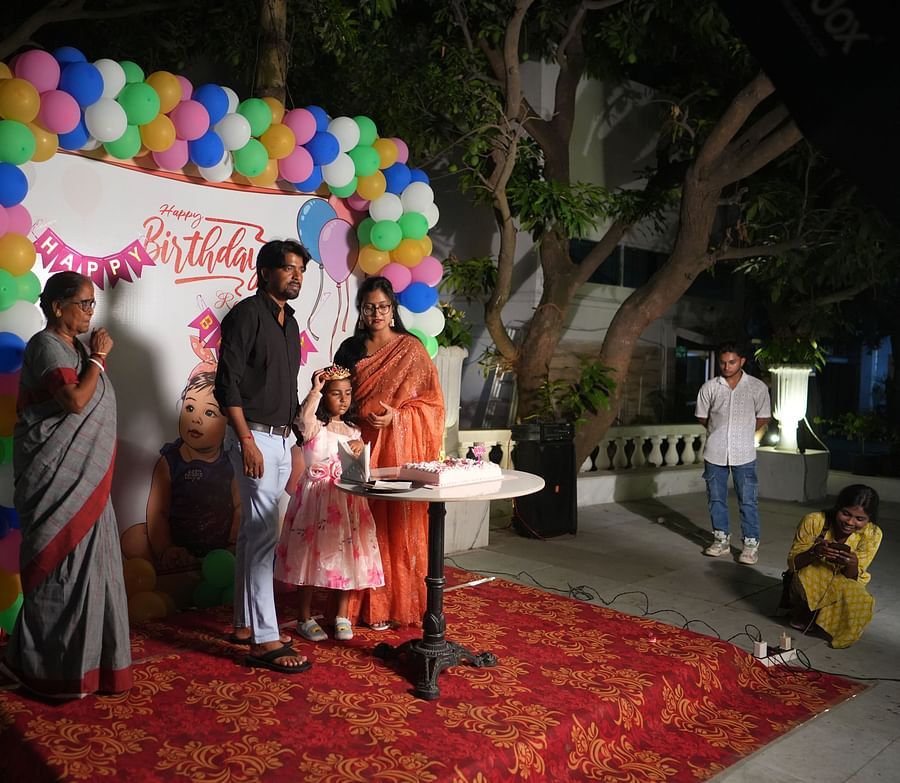 Guests at Rangamati Garden Resort celebrate a birthday with cake cutting and joyful moments.