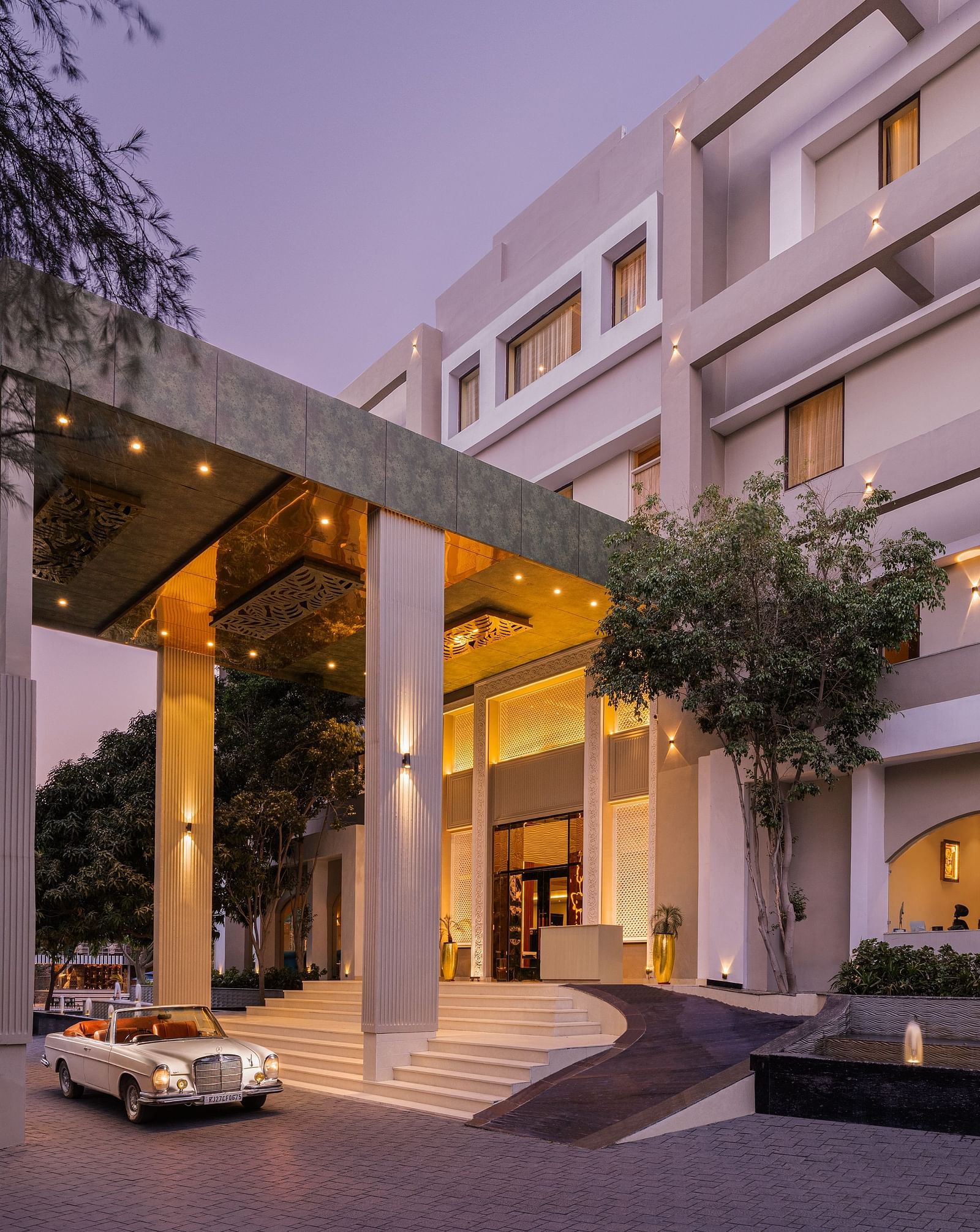 Entrance view taken from a side angle at Essentia Luxury Resort & Spa, Udaipur.