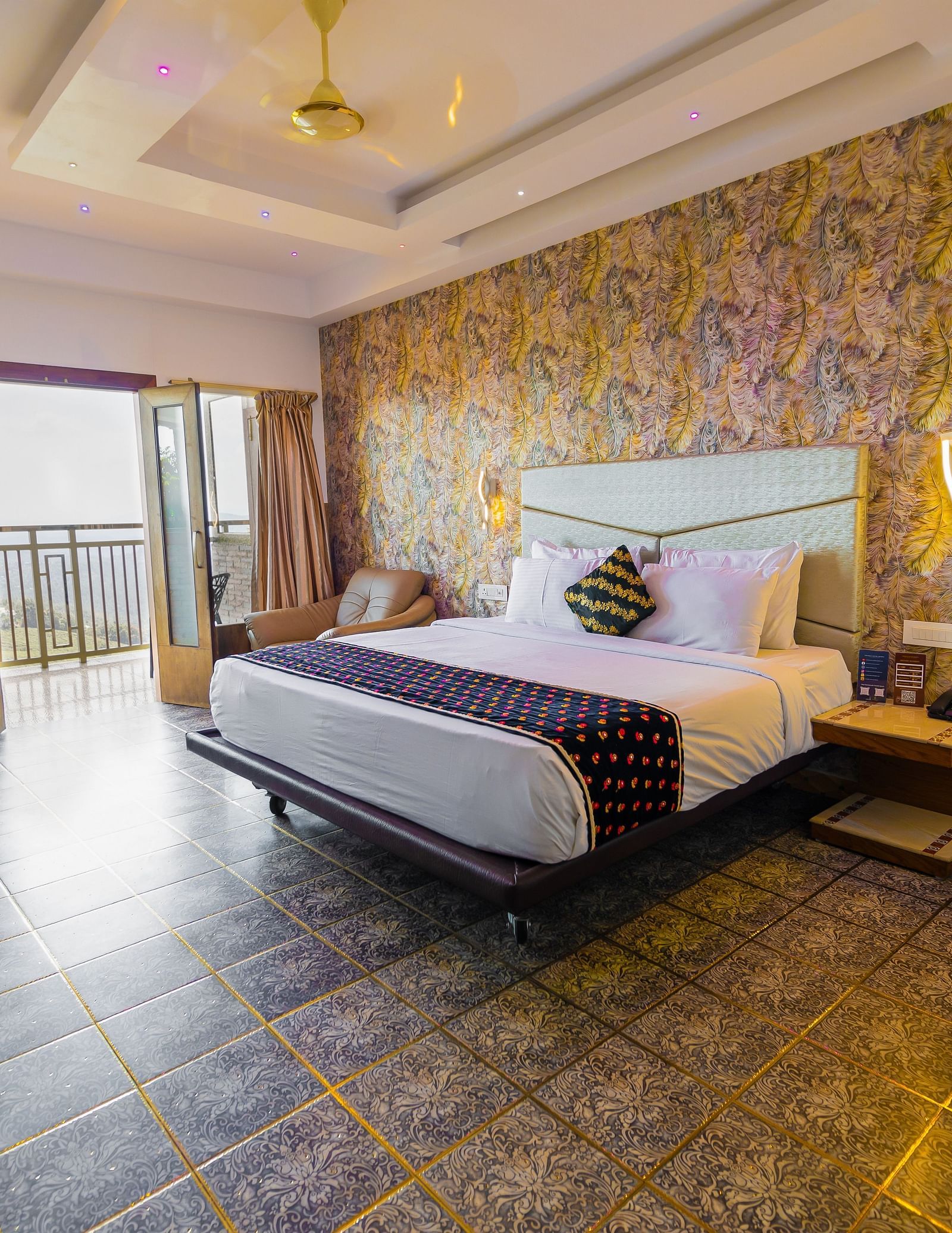 A double bed at the Premium Club Suite at Parakkat Nature Hotel and Resorts Munnar 3