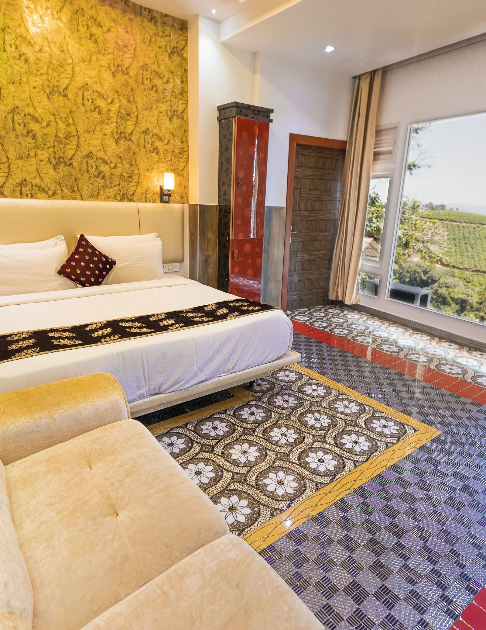 a double bed with a huge balcony at the Two Bedroom Mini Pool Villa at Parakkat Nature Hotel and Resorts Munnar 2