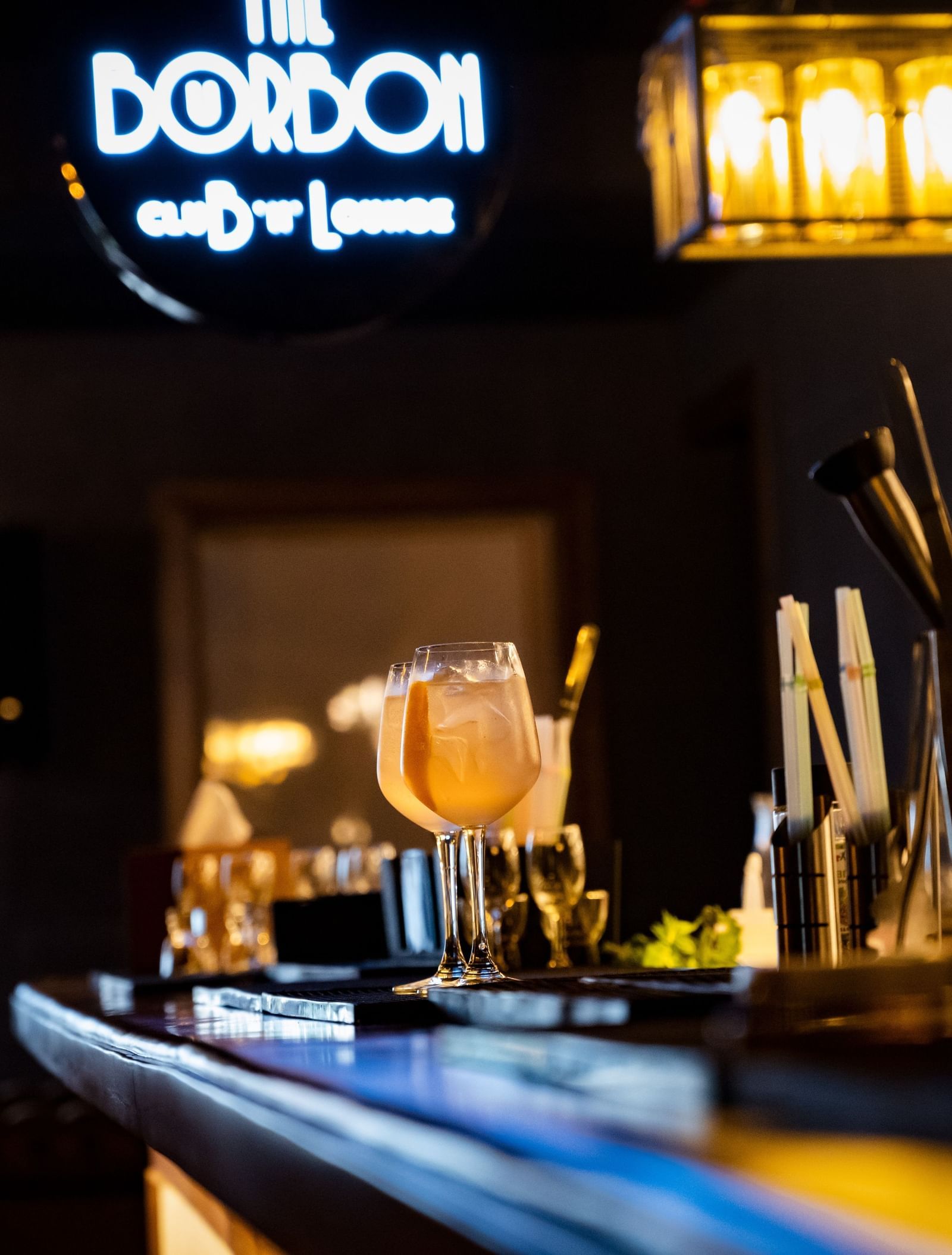 image of the bar counter top with various bar essentials at the bourbon club and lounge - The Tattva Boutique Resort