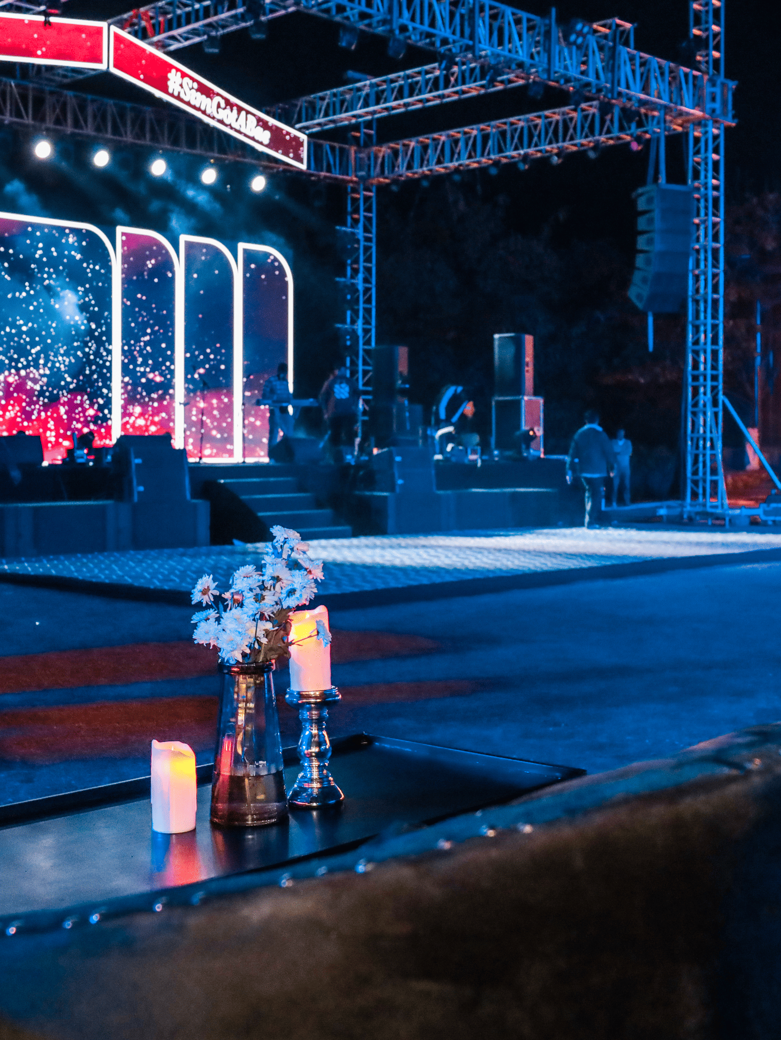 Outdoor stage setup with seating and lighting arrangements at Ananta Spa and Resorts, Jaipur.