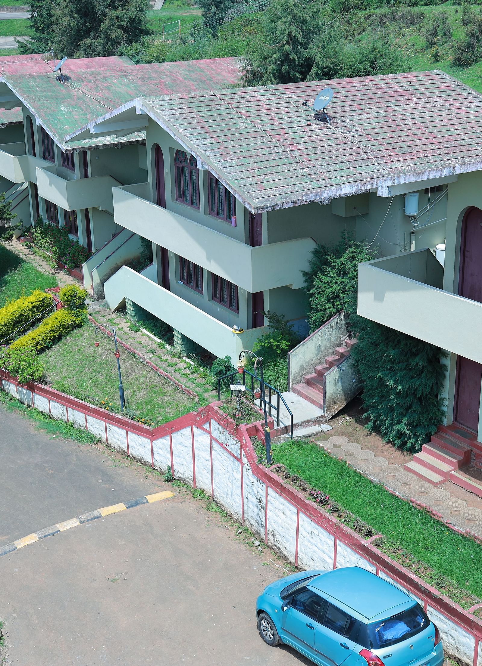Facade image of Mango Hill Shola Ooty with greenery in the background | Mango Hill Shola, Ooty