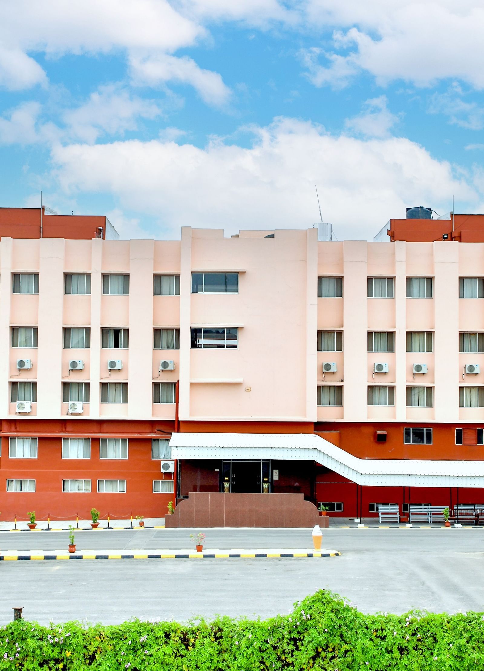 A long shot of the facade of Hotel Sahara in Ramoji Film City - Hotel Exterior in Hyderabad.