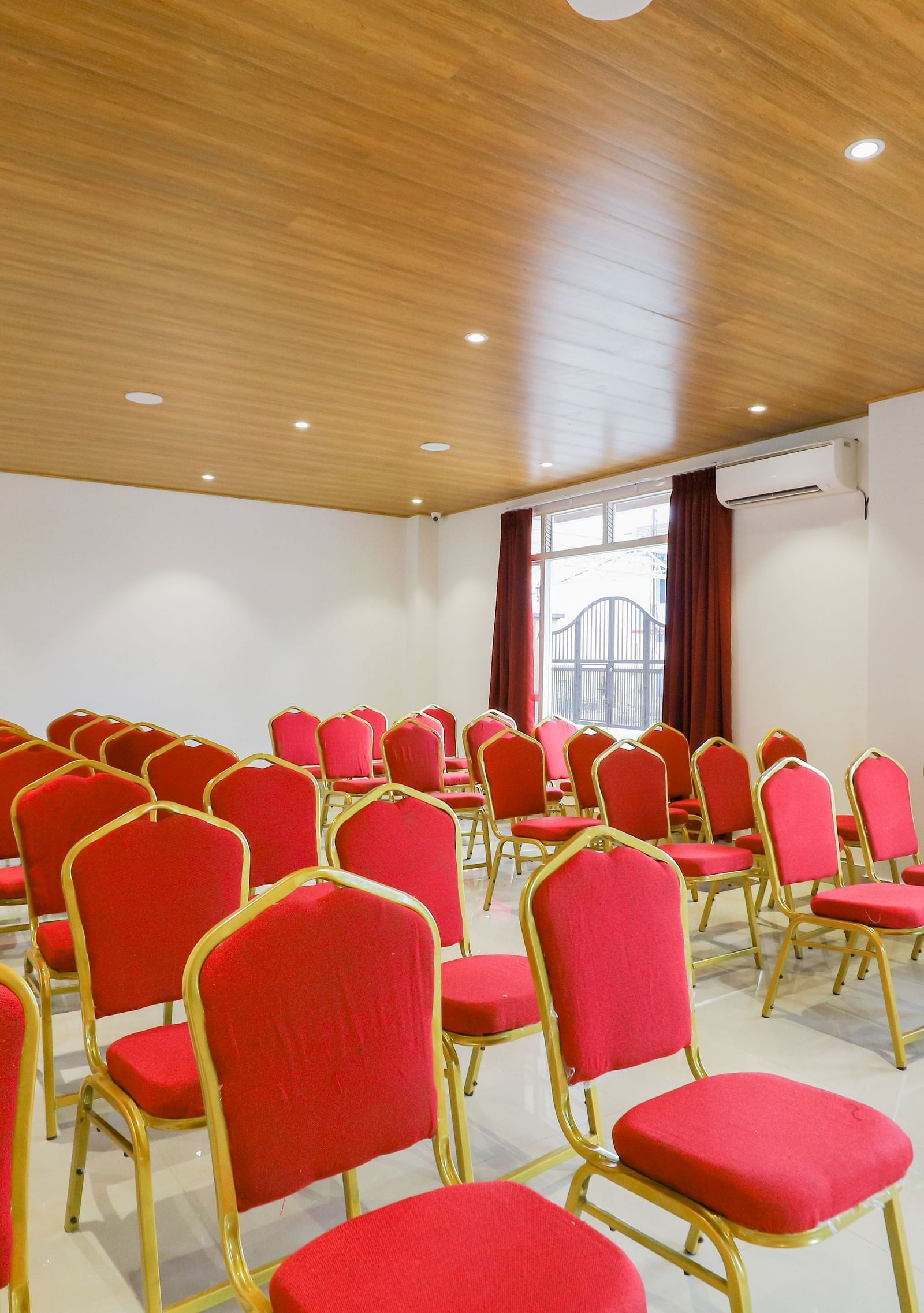 event setting with red chairs at Banari Regency by Summit, Namchi