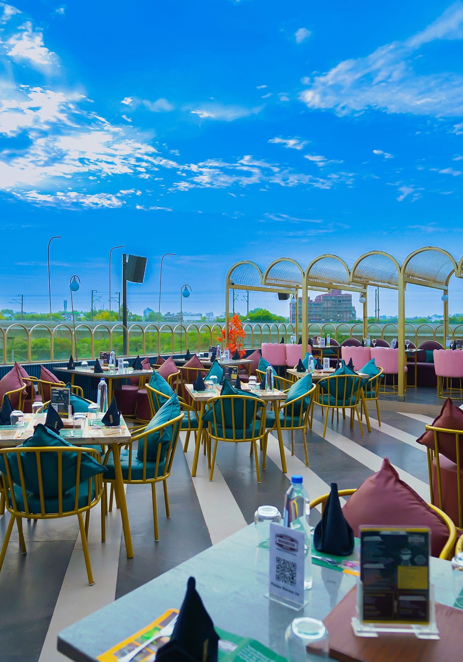 An image of a seating arrangement on the rooftop at Themis Barbeque House