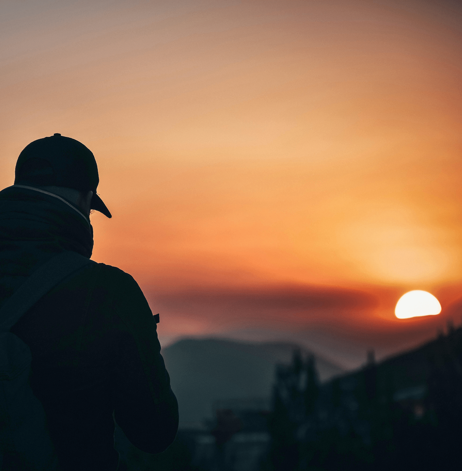 image of a person soaking in the sunset