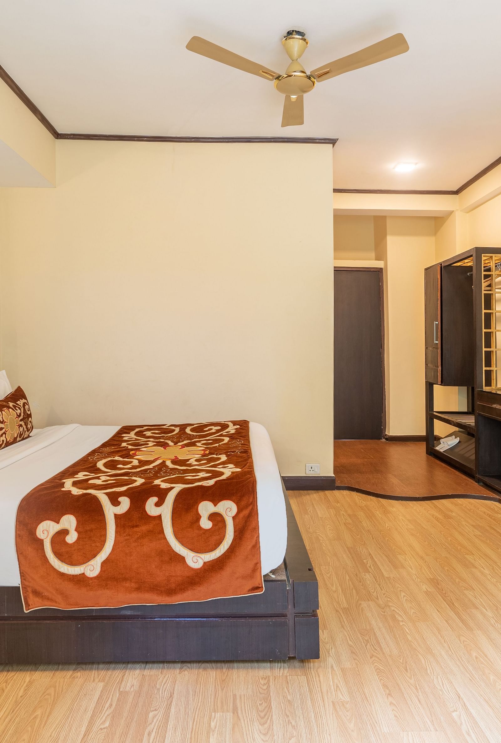 king size bed of deluxe bed at Summit Lillium Hotel & Spa, Kalimpong