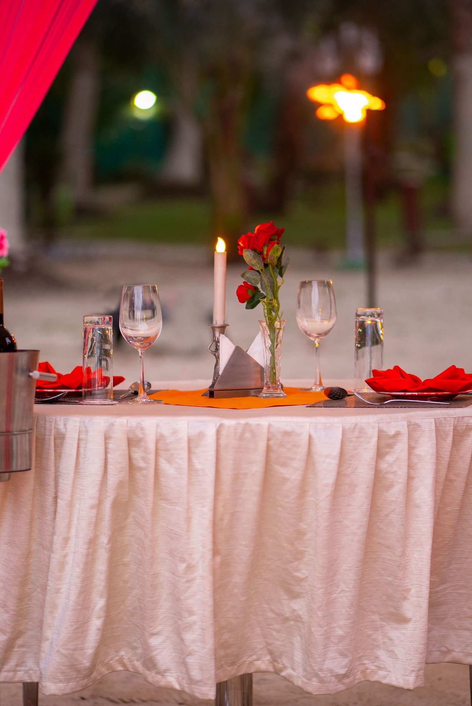 Romatic set up with table for two at Coral Reef Hotel & Resort