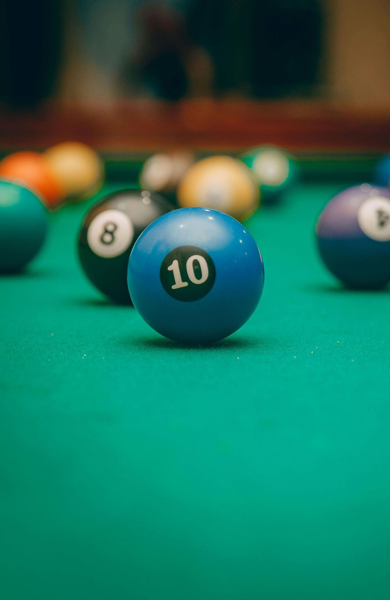 Billiard balls on a pool table.