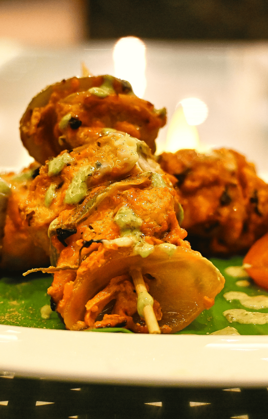 Image of a plate filled with food on skewers at Coorg Jungle Camp Backwater Resort, Kushalnagar.
