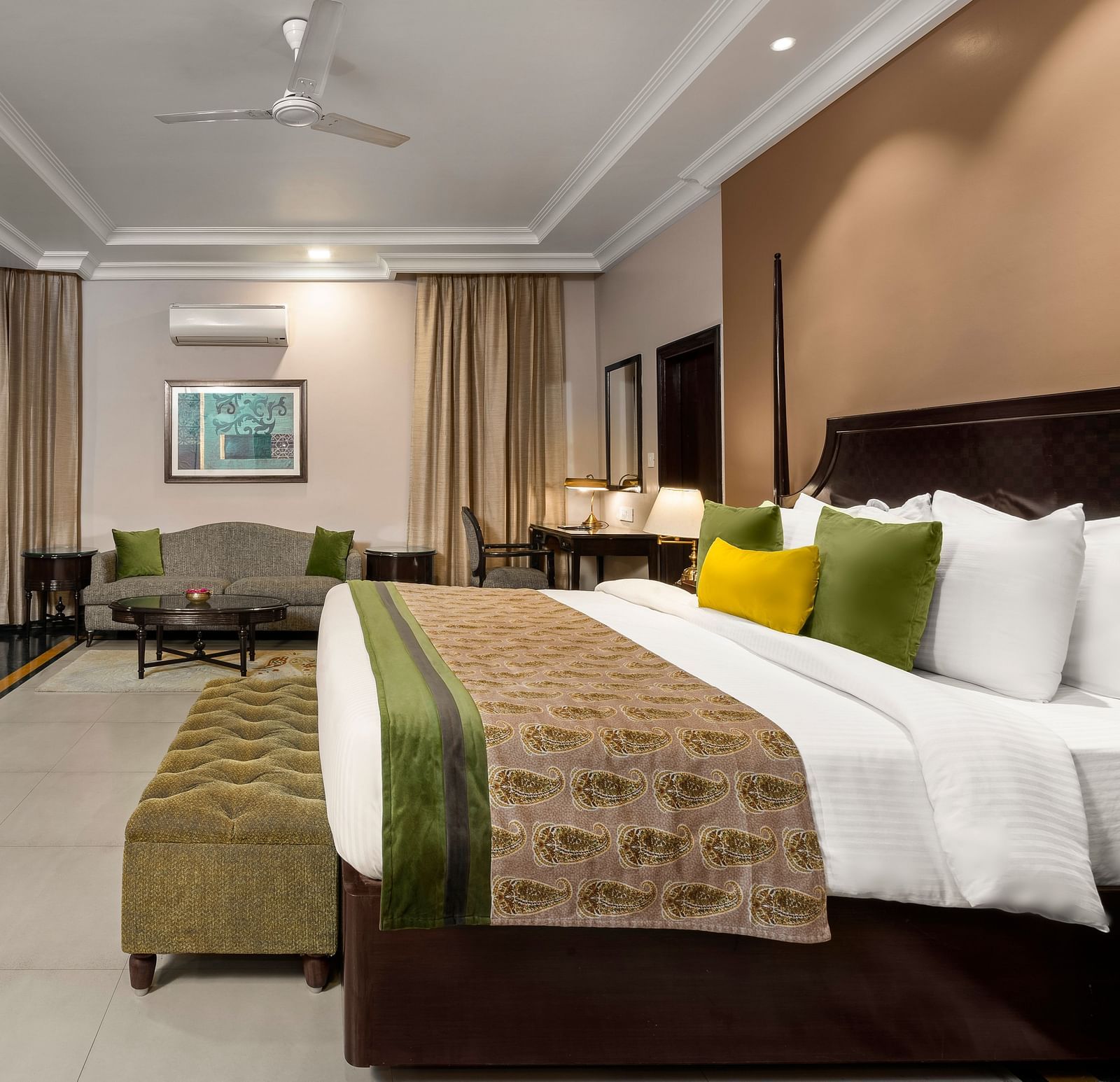 Ganga View Suite side shot with the bed facing a television and sofa on the far end of the room - Ganga Lahari, Haridwar