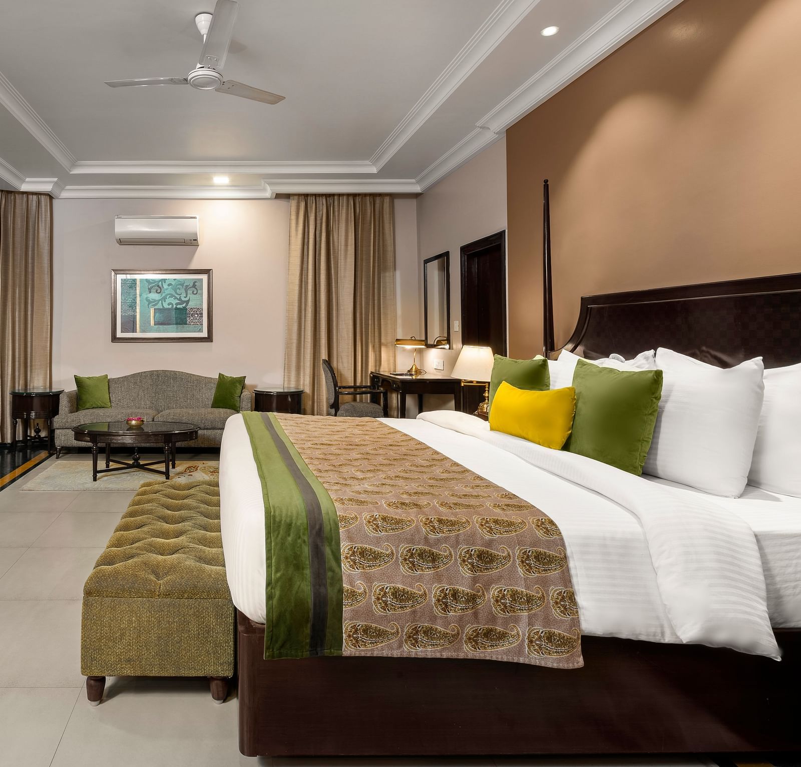 Ganga View Suite side shot with the bed facing a television and sofa on the far end of the room - Ganga Lahari, Haridwar