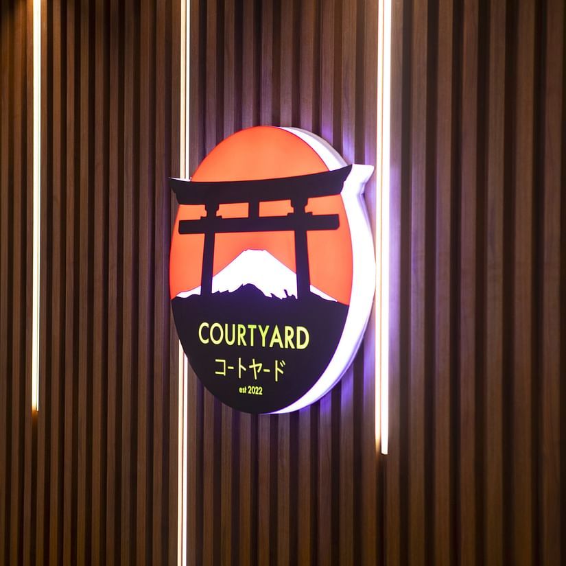 Courtyard By Yuhi Hospitality Services Tirupati Logo