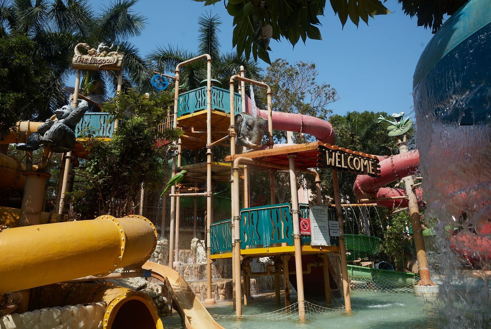 Image of Waterfall at Water Kingdom under clear blue sky