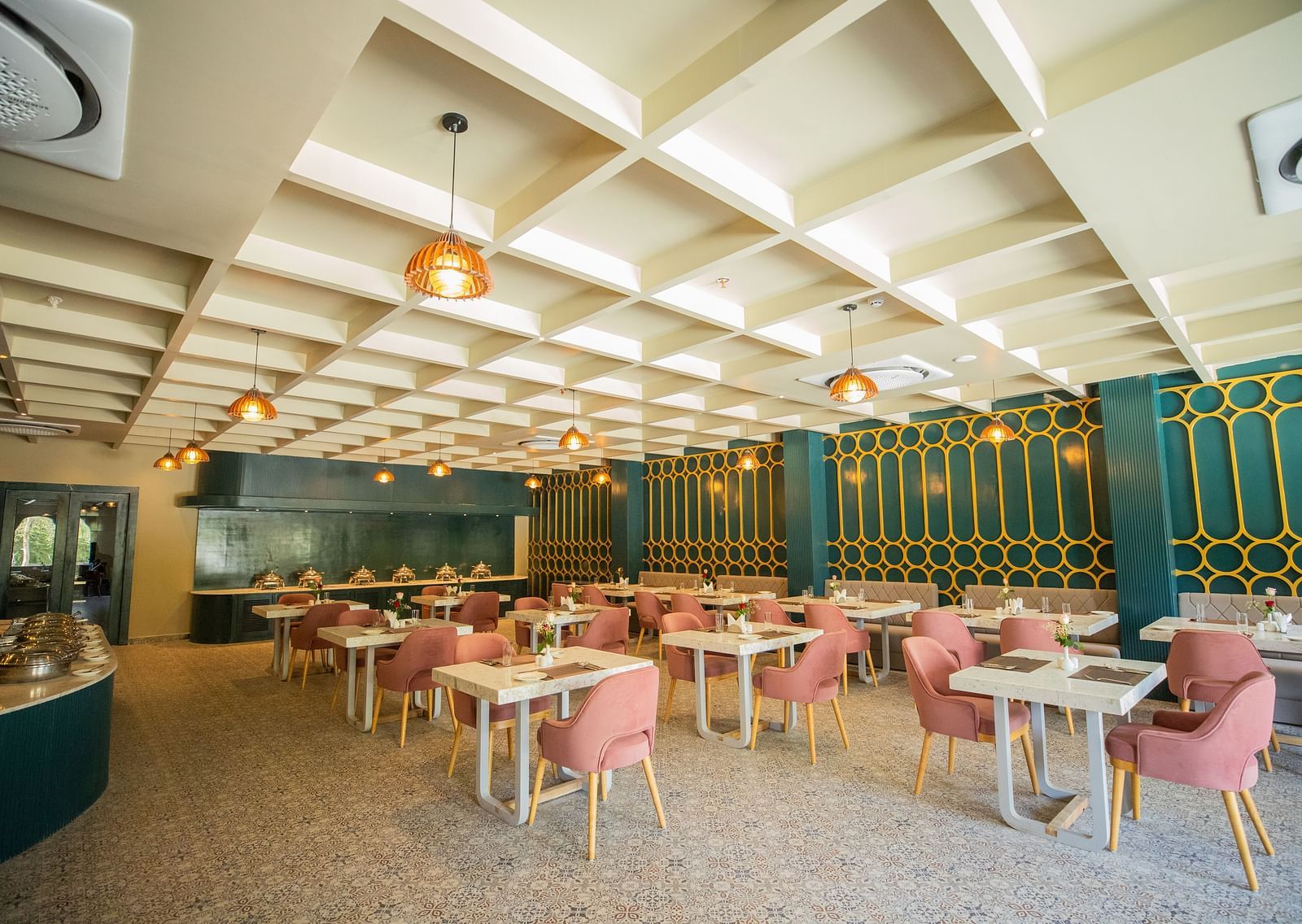 A dining setting of Blue Salt and Coffee at Essentia Luxury Resort & Spa, Udaipur. 