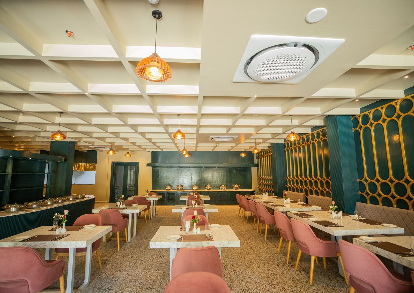 A dining setting of Blue Salt and Coffee at Essentia Luxury Resort & Spa, Udaipur. 