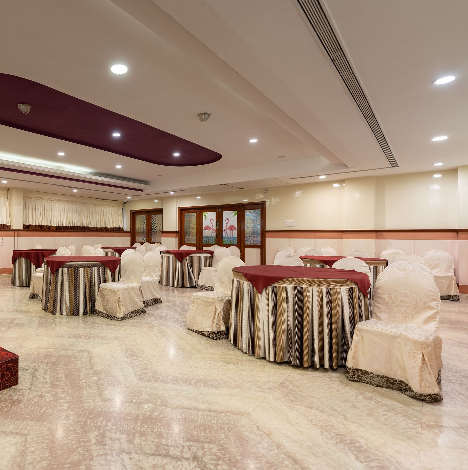 Seating arrangements inside the banquet hall - Hotel Pai Comforts, JP Nagar