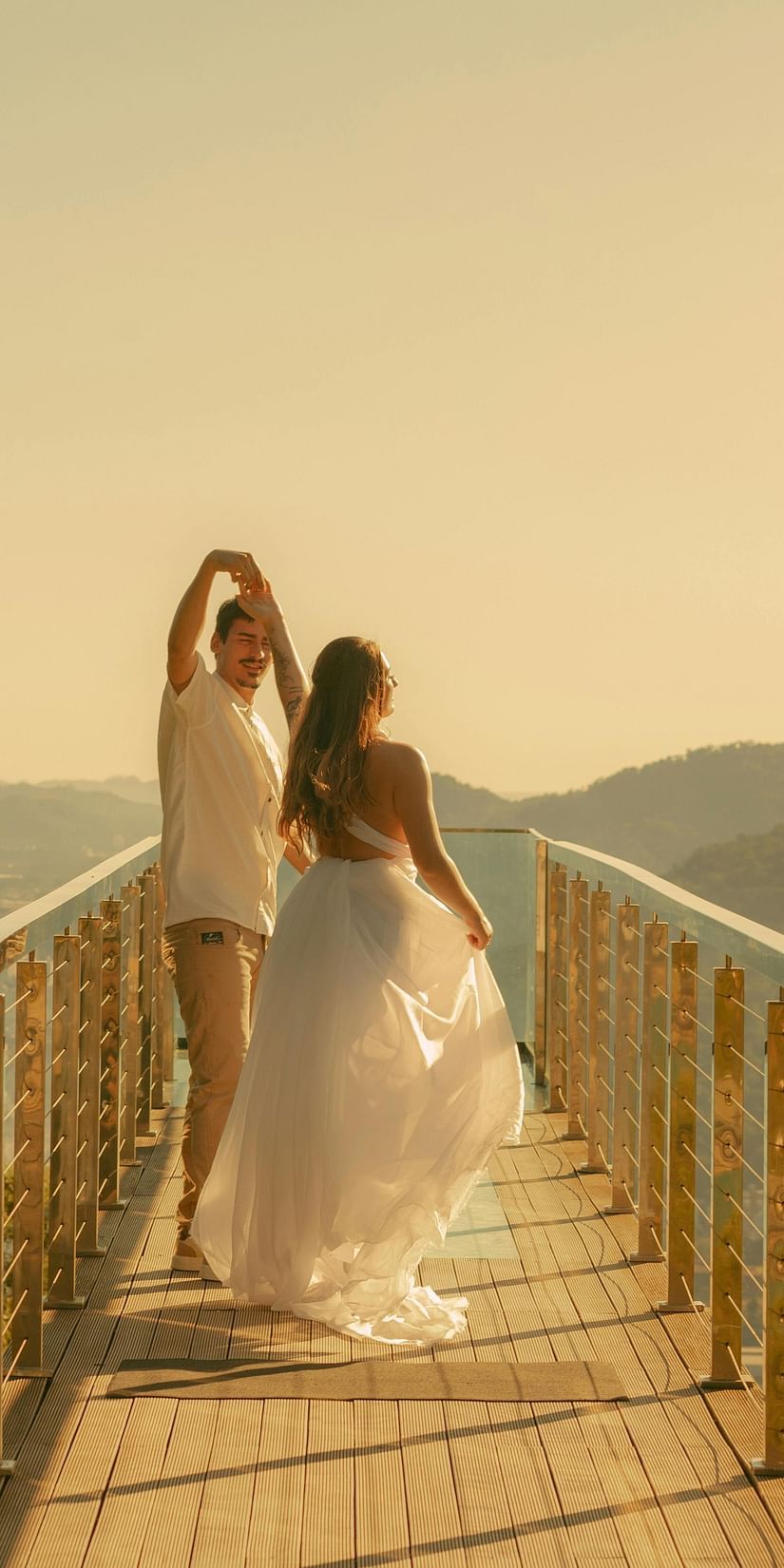 Picture featuring a couple captured in the day time