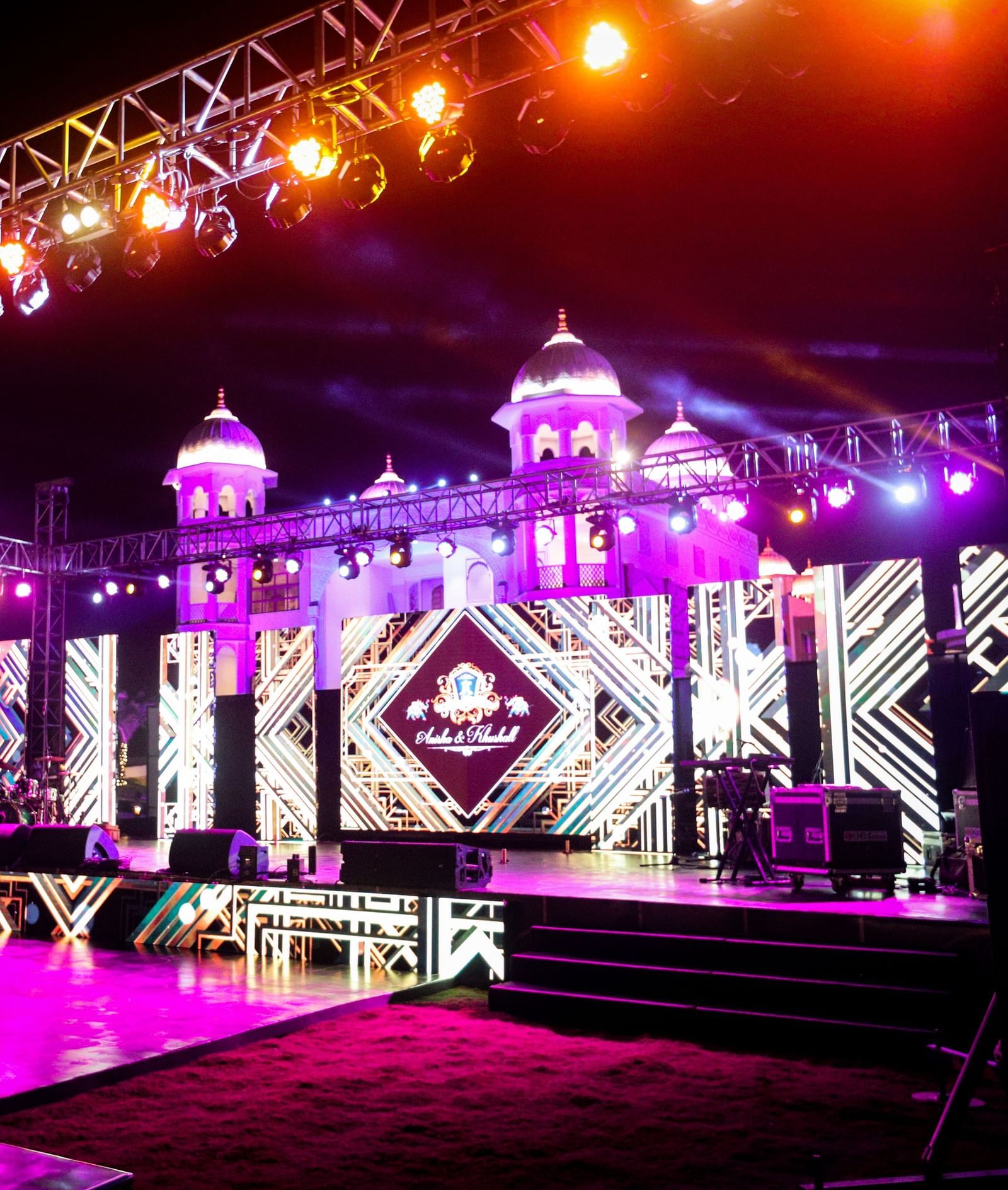 A view of the stage illuminated with neon lights featuring a digital screen - Kaldan Samudhra Palace