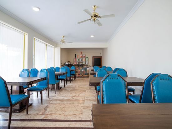 The dining arrangement at Divo - Stone Wood Riverfront Resort, Siolim