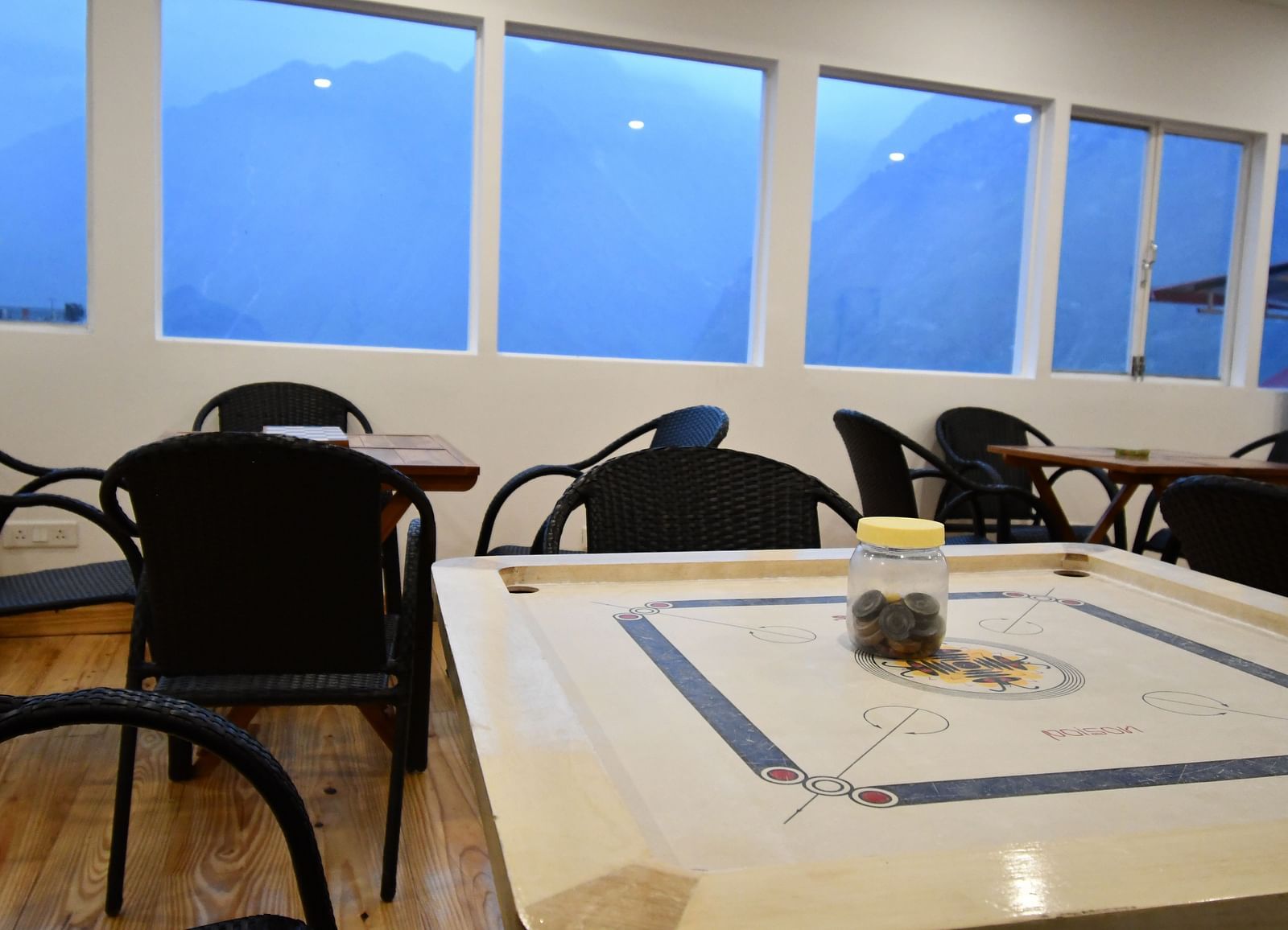 image of the indoor games area featuring a carrom board at the tattva, joshimath