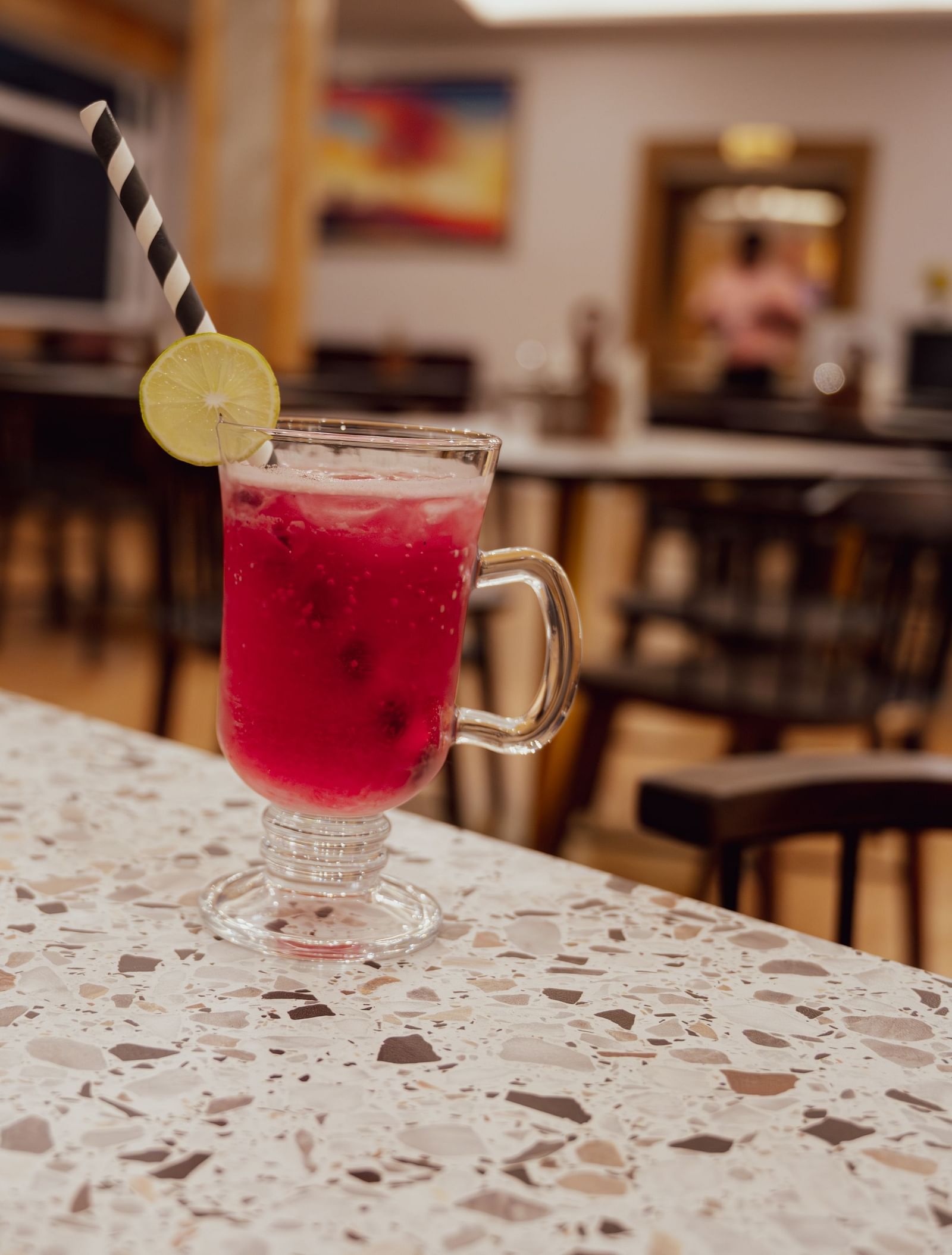 Shot of a drink kept on the table of the restaurant | The Tattva Devprayag