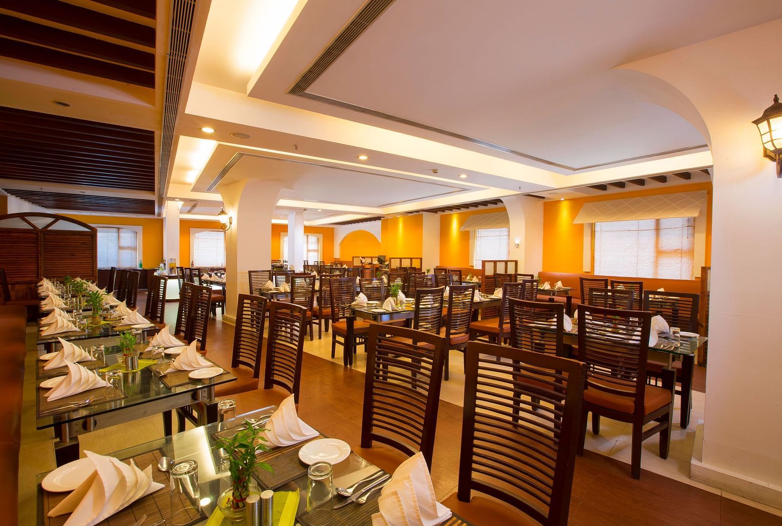 Le Boulevard featuring a dining table at Hotel Atithi - TGI Grand, Pondicherry