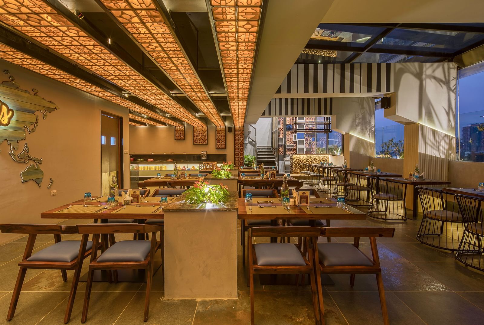 Interior seating at Roastopolis Restaurant at Le Foliage by TGI, Bangalore 