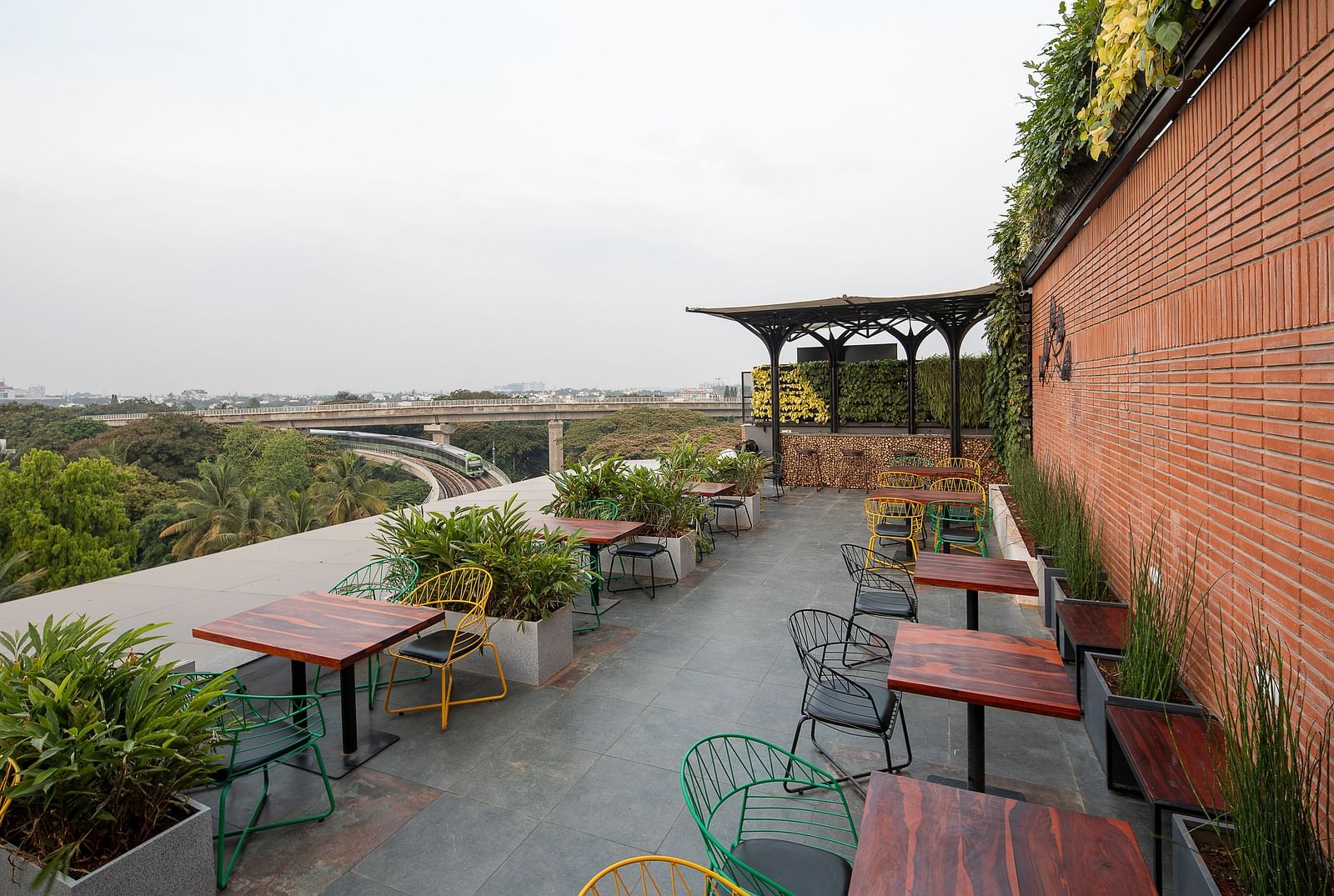Outdoor Seating at Roastopolis Restaurant in Le Foliage by TGI, Bangalore 