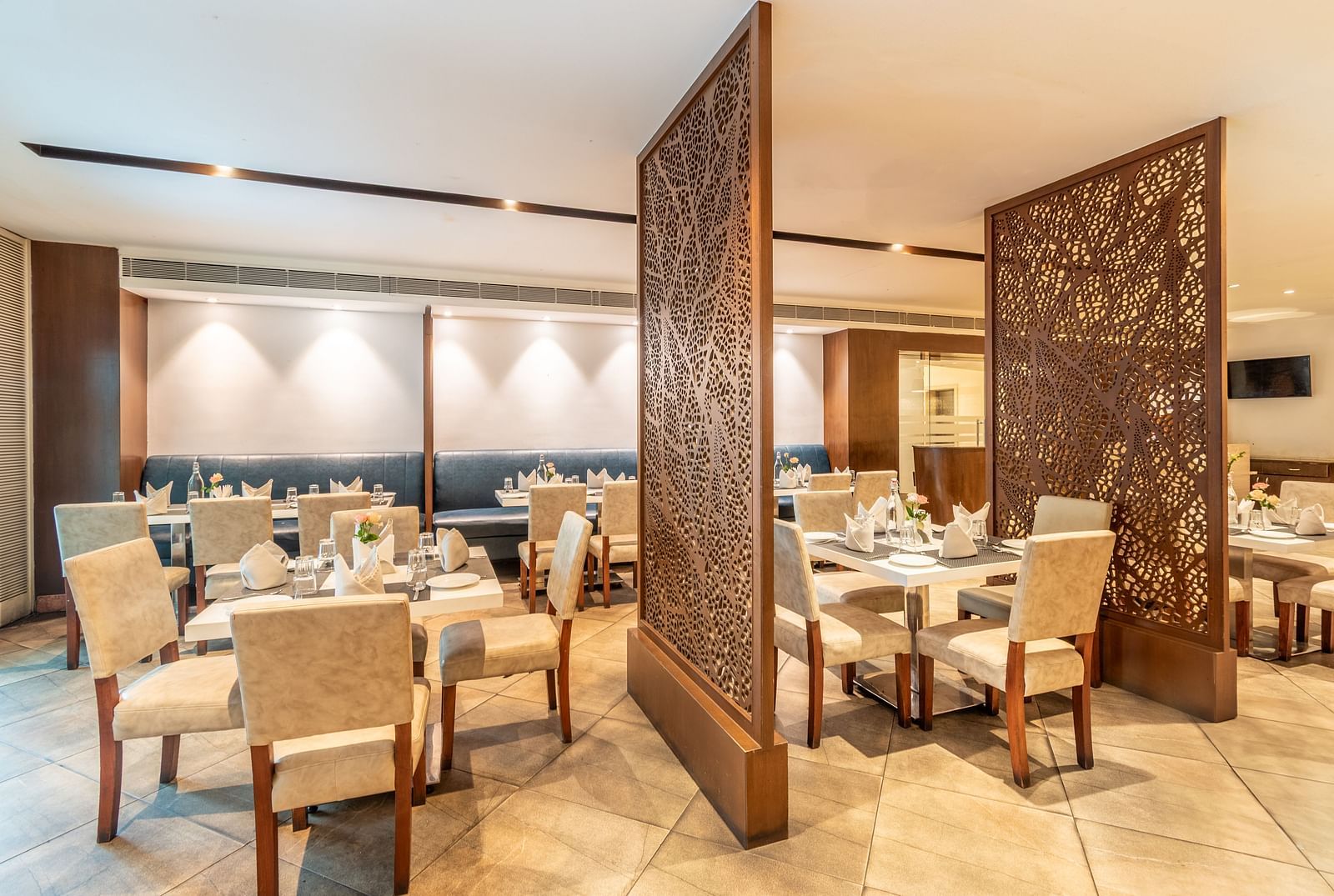 Intimate dining setup with soft lighting and modern aesthetics