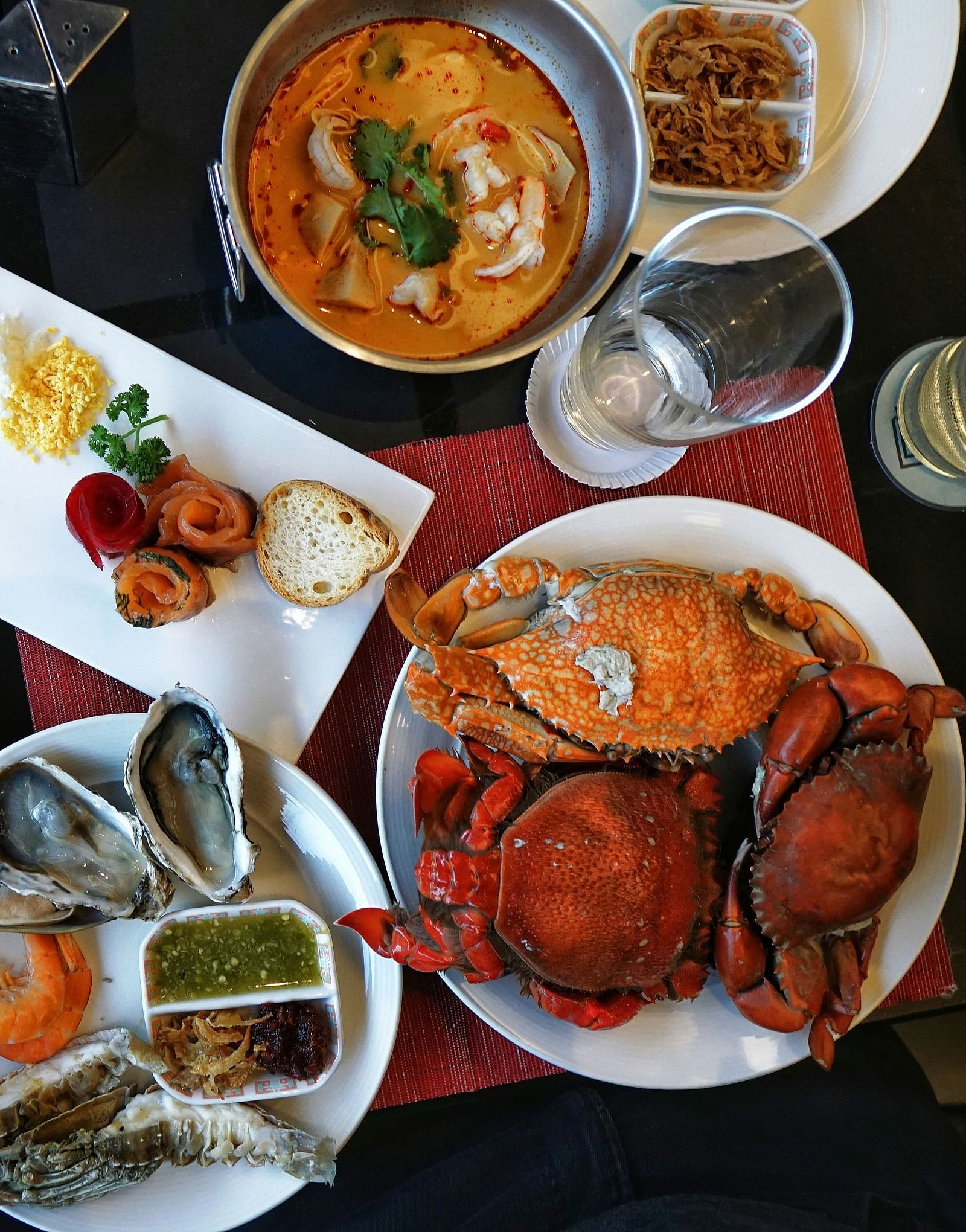 Various seafood dishes arranged on a table.